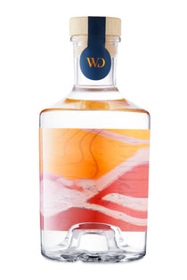 Wandering Distillery Nomad Gin back of bottle on a white background